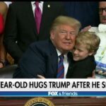 9-Year-Old Boy With Muscular Dystrophy Hugs Trump at Bill Signing