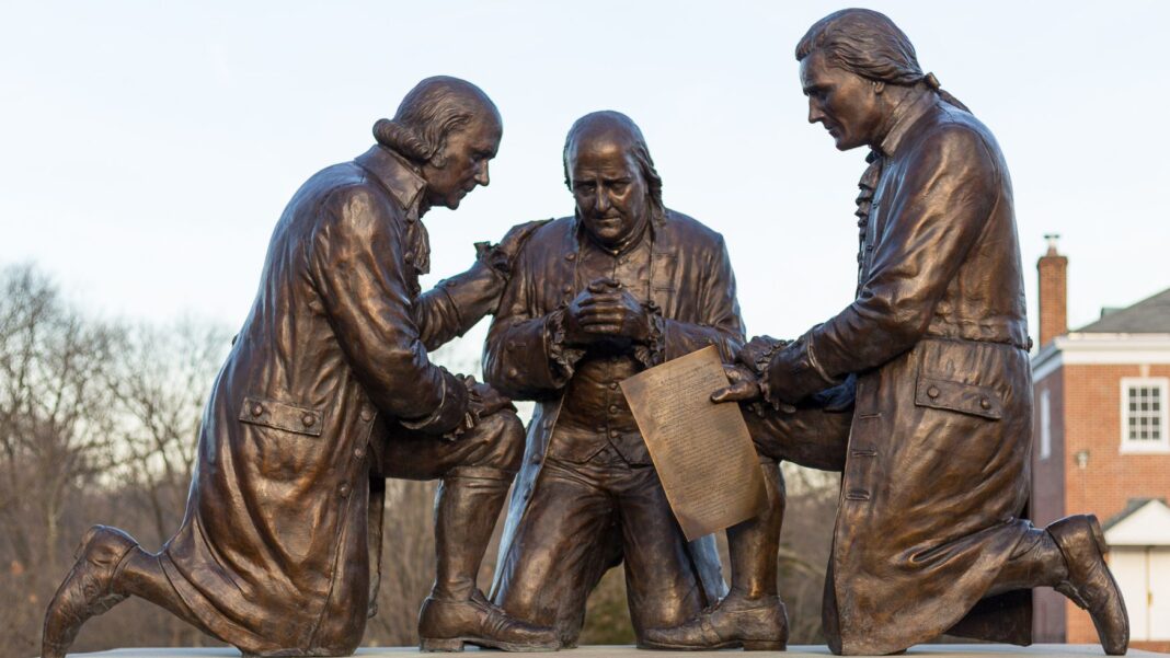 This statue by Stan Watts depicts Founding Fathers John Adams, Benjamin Franklin and Thomas Jefferson kneeling in prayer.