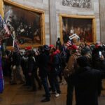 Supporters of President Donald Trump enter the U.S. Capitol's Rotunda in Washington on Jan. 6, 2021.