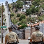 Border Patrol agents patrol the border in Nogales, Arizona
