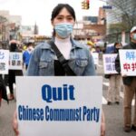 Falun Gong practitioners take part in a parade in Flushing, New York