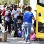 Illegal Immigrants boarding bus in Del Rio Texas