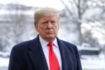 President Donald Trump speaks to reporters on the South Lawn of the White House in Washington on Jan. 14, 2019.