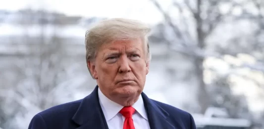 President Donald Trump speaks to reporters on the South Lawn of the White House in Washington on Jan. 14, 2019.