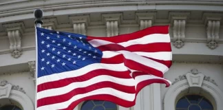 The U.S. flag at the dome of the U.S. Capitol building in Washington on May 12, 2023.
