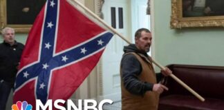 Man Who Carried Confederate Flag In Capitol Has Turned Himself In