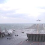 Chinese aircraft carrier Liaoning carries out drill with J-15 jets on board