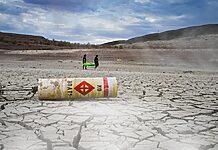 A buoy that reads “No Boats” lays on dry waterbed at Lake Mead, Nev., on July 23, 2022.