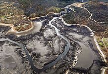 An aerial view of the empty reservoirs that once held water behind major dams on the Klamath River.