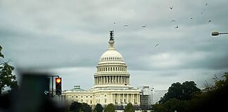 The U.S. Capitol building is seen at sunrise in Washington on July 31, 2023.