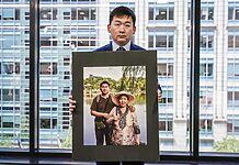 Simon Zhang and his mother, who was tortured to death in China,