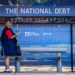 The national debt clock at a bus station in Washington on Aug. 6, 2024.