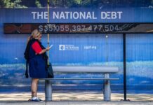 The national debt clock at a bus station in Washington on Aug. 6, 2024.