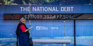 The national debt clock at a bus station in Washington on Aug. 6, 2024.