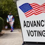 Voters take to the polls in Smyrna, GA., on Oct. 15, 2024.