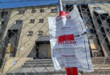 An apartment building complex on Nome Street in Aurora, Color., was shut down by the city recently over code violations. Residents say the building was a hotspot for migrant gang activity. Photo taken on Aug. 30, 2024. Allan Stein/The Epoch Times