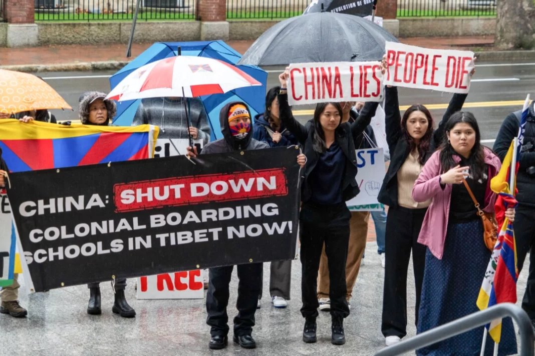 Students and activists protest against the Chinese communist regime's human rights abuses