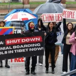 Students and activists protest against the Chinese communist regime's human rights abuses