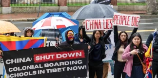 Students and activists protest against the Chinese communist regime's human rights abuses