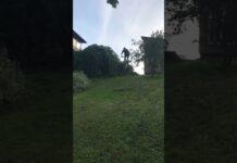 MTBer Face-Slides Down a Grass Hill