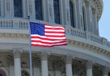 A U.S. flag flies at the U.S. Capitol in Washington on May 13, 2024.