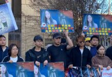 human rights group holds a rally to protest the Chinese regime